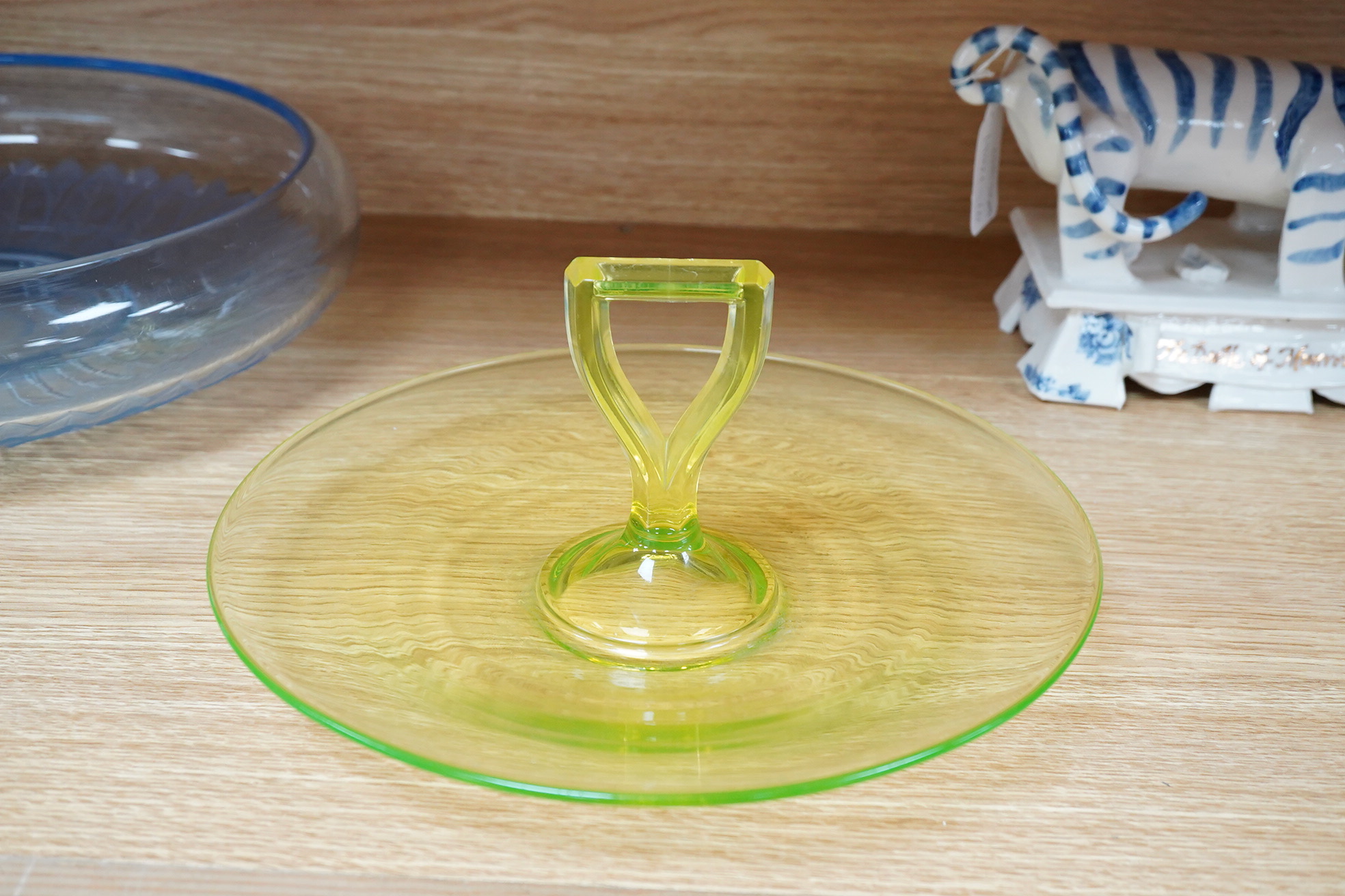 A Muller Art Deco glass dish, together with a uranium glass cake stand, largest 32cm in diameter